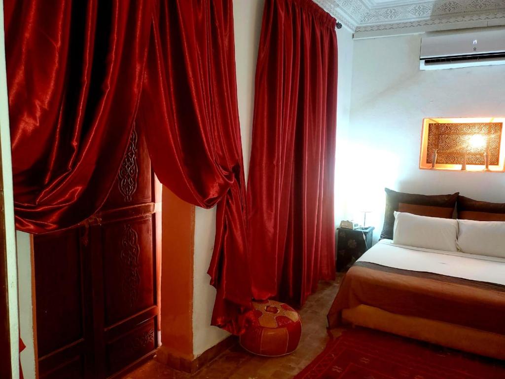 Postel nebo postele na pokoji v ubytování Riad Rêve d Antan , Real Dream
