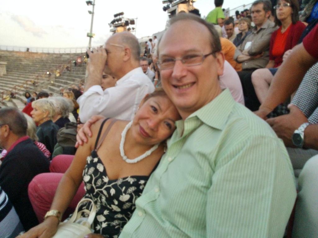 a man and a woman sitting in an audience at Villa Sartori in Legnago