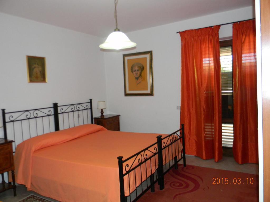 Postel nebo postele na pokoji v ubytování Casa Vacanza Malescale