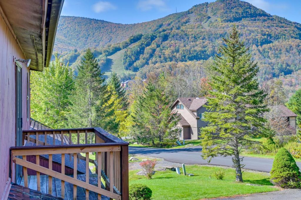 a house with a balcony with a view of a mountain at New York Retreat - Furnished Deck and Mountain Views in Lanesville