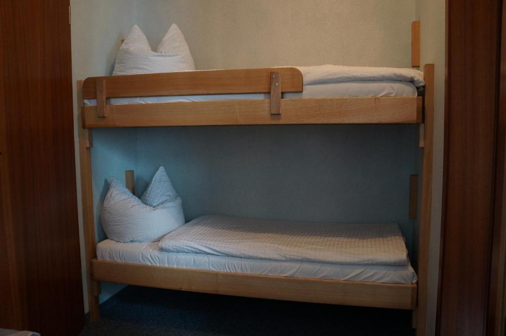 Postel nebo postele na pokoji v ubytování Gasthof Goldene Krone