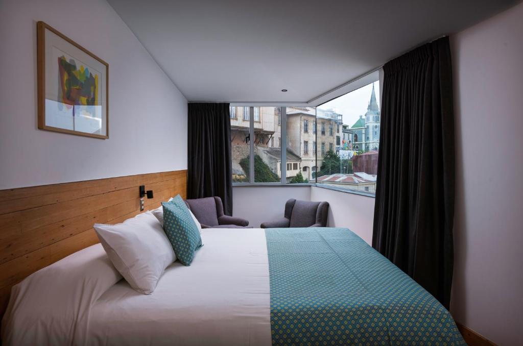 Postel nebo postele na pokoji v ubytování Fauna Hotel