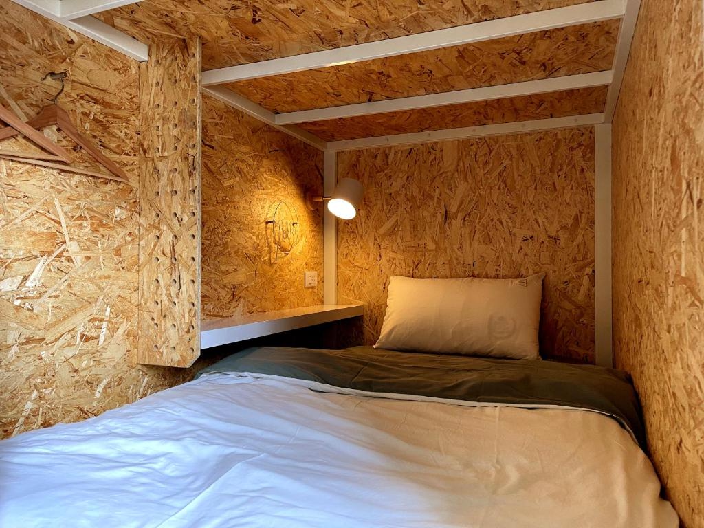 Postel nebo postele na pokoji v ubytování Funtime Hostel