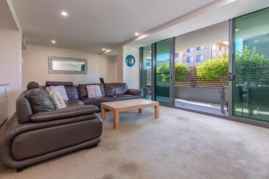 Гостиная зона в Strand Beachside 104