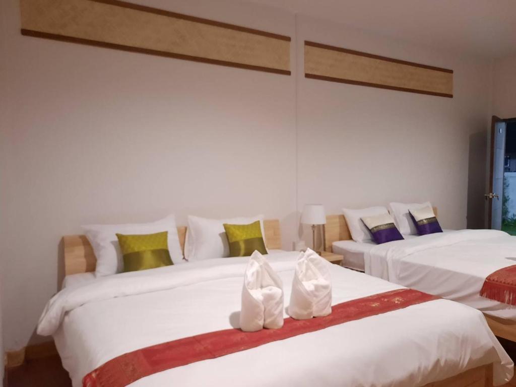 Postel nebo postele na pokoji v ubytování Hotel Pailifornia