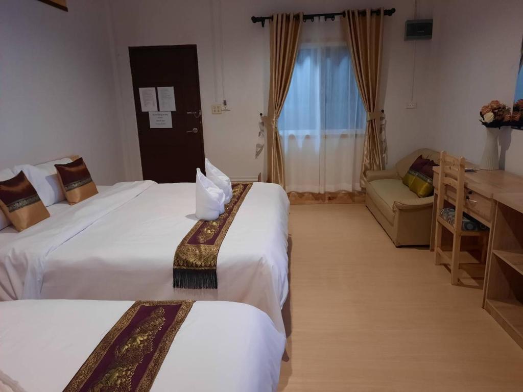 Postel nebo postele na pokoji v ubytování Hotel Pailifornia