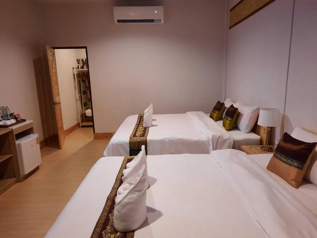 Postel nebo postele na pokoji v ubytování Hotel Pailifornia