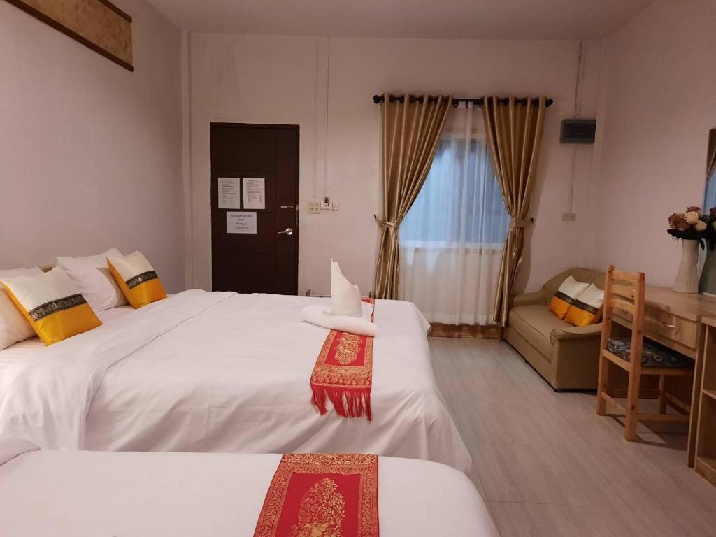 Postel nebo postele na pokoji v ubytování Hotel Pailifornia