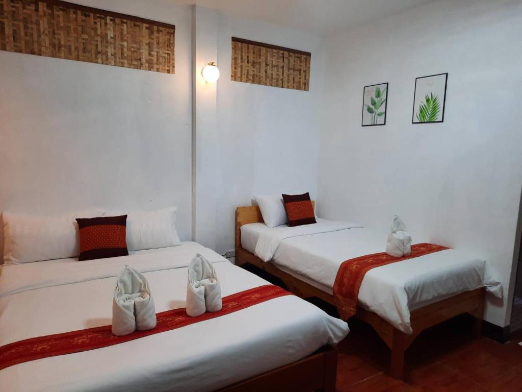 Postel nebo postele na pokoji v ubytování Hotel Pailifornia