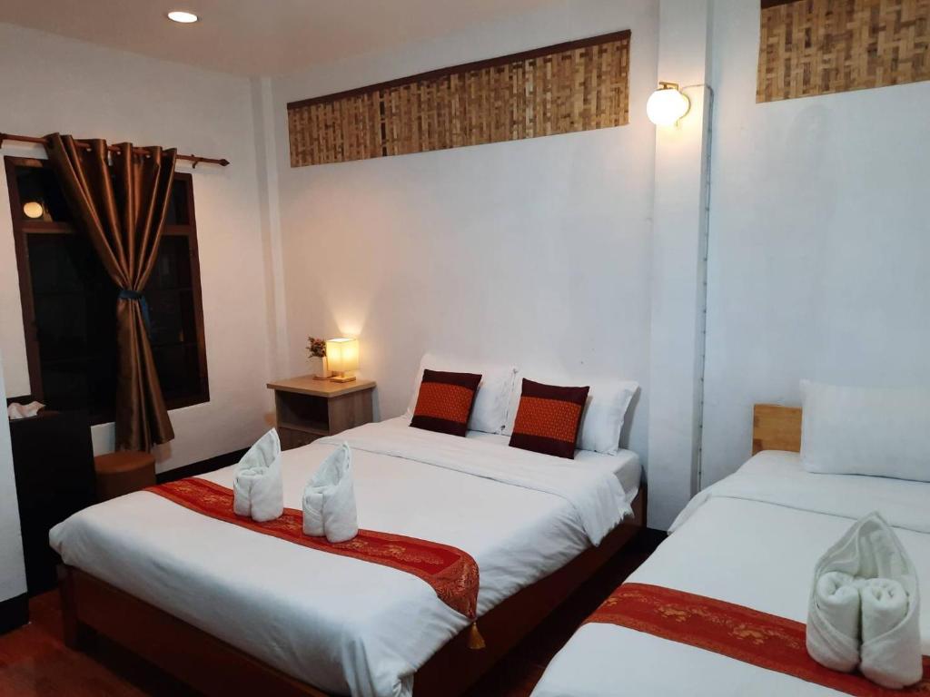 Postel nebo postele na pokoji v ubytování Hotel Pailifornia