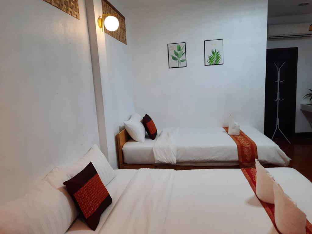 Postel nebo postele na pokoji v ubytování Hotel Pailifornia