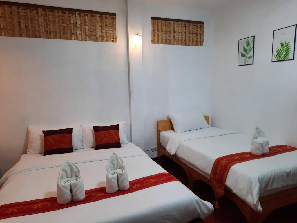 Postel nebo postele na pokoji v ubytování Hotel Pailifornia