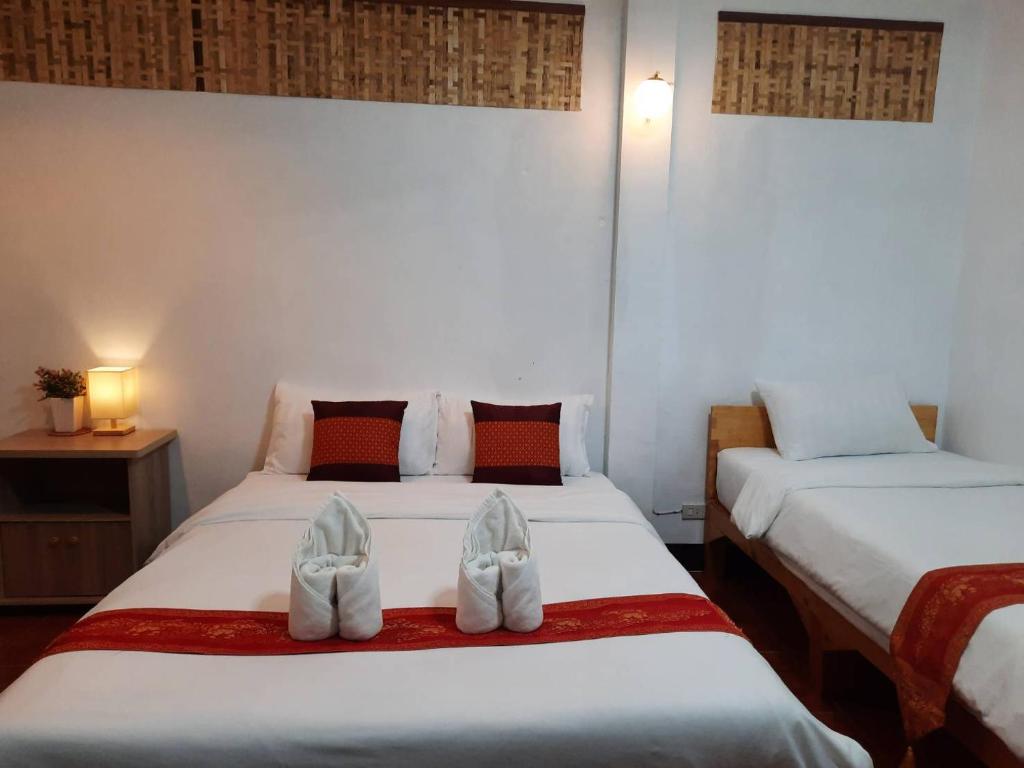 Postel nebo postele na pokoji v ubytování Hotel Pailifornia