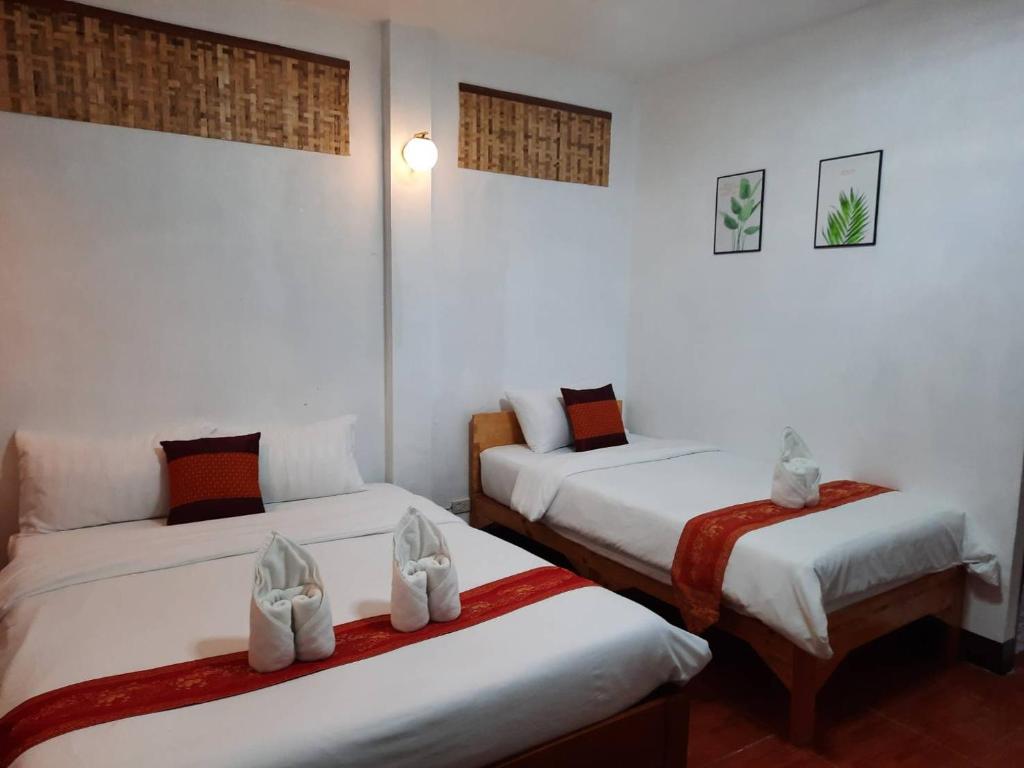 Postel nebo postele na pokoji v ubytování Hotel Pailifornia