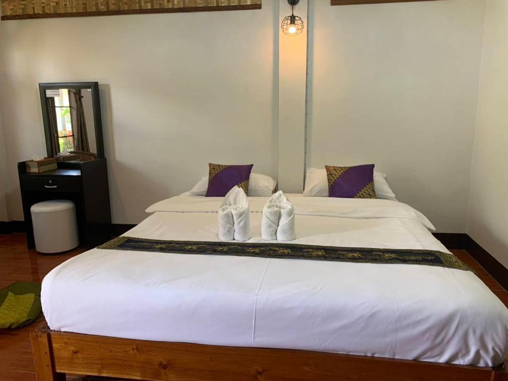 Postel nebo postele na pokoji v ubytování Hotel Pailifornia