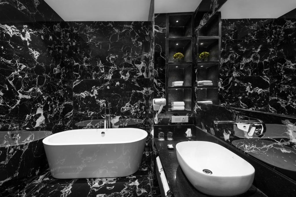 Koupelna v ubytování Palasa Hotel
