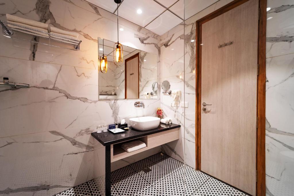 Koupelna v ubytování Palasa Hotel
