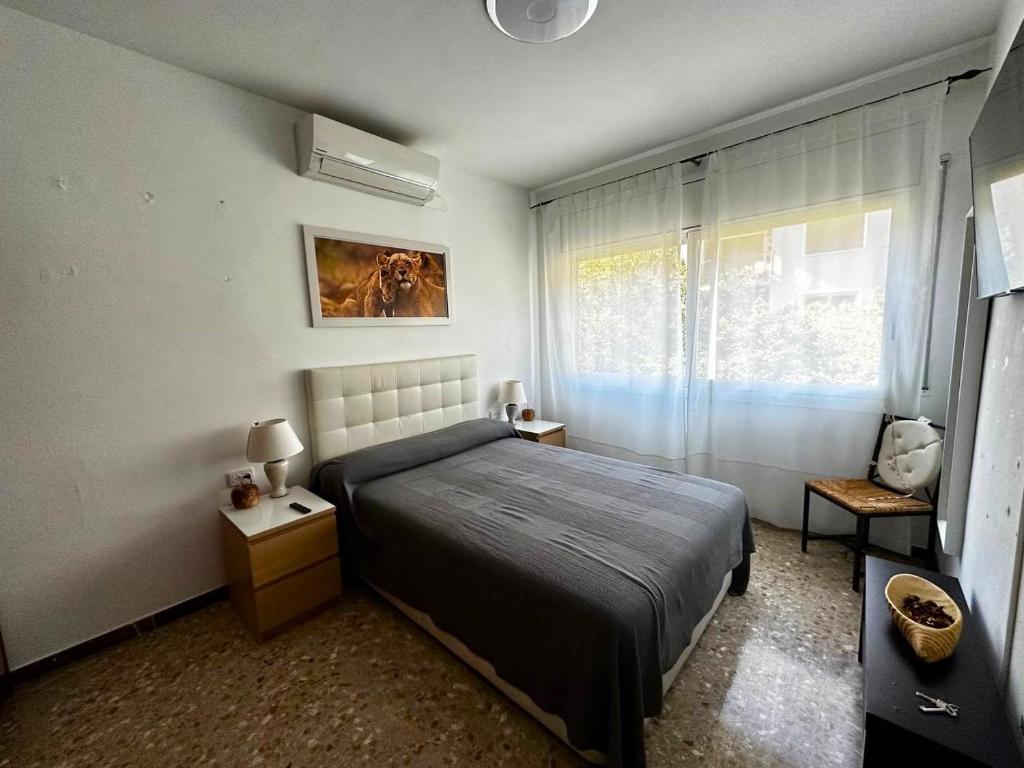 Кровать или кровати в номере Rooms Sepulveda
