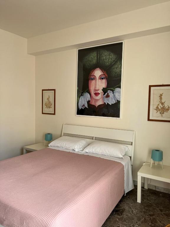 Postel nebo postele na pokoji v ubytování Casa Gentile Carducci