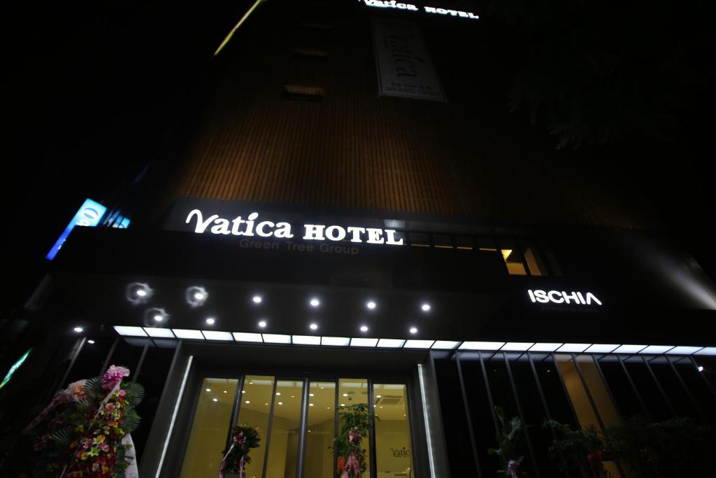 a store front of a valeria hotel at night at Vatica Hotel Dongdaemun in Seoul