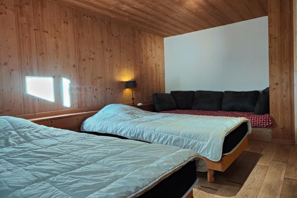 Krevet ili kreveti u jedinici u objektu Chalet Alpina