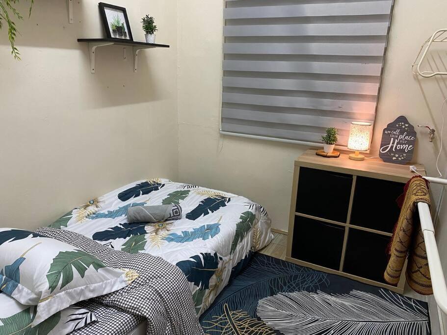 Postel nebo postele na pokoji v ubytování Tulip Hijau Homestay - Bukit Beruntung - 4Bedrooms