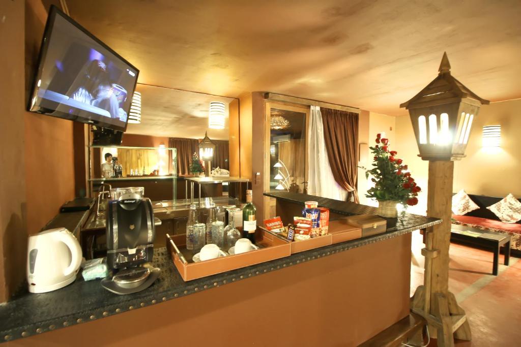 TV a/nebo společenská místnost v ubytování Sky Suites