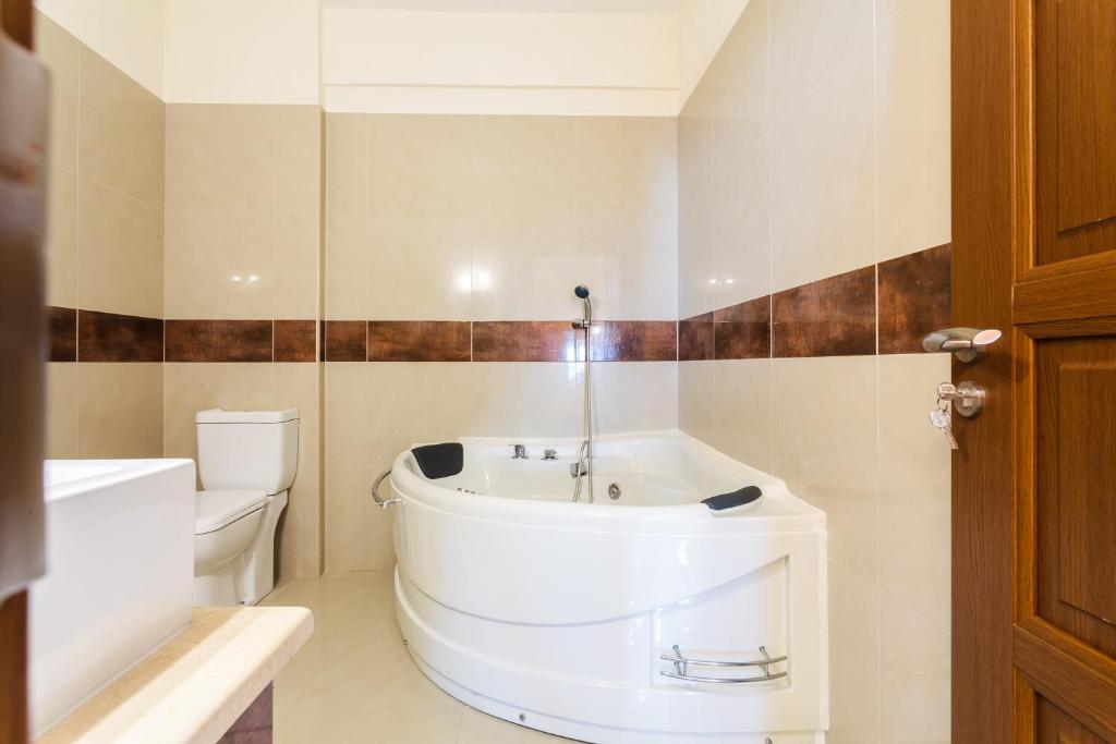 A bathroom at Villa Armonia, Sunset View and Relaxing Beach Vibe