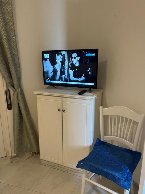 TV a/nebo společenská místnost v ubytování casa Ricciulella