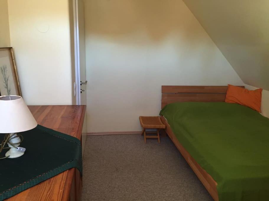 Postel nebo postele na pokoji v ubytování Haus KAIROS