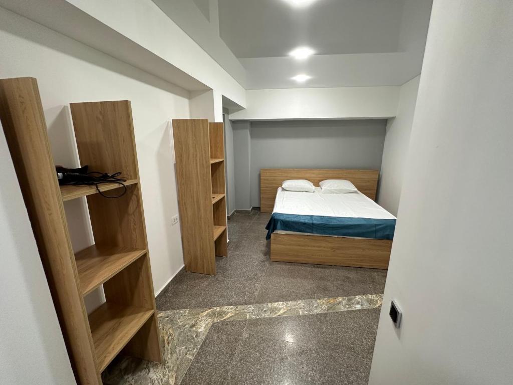 Postel nebo postele na pokoji v ubytování Friendly Hotel