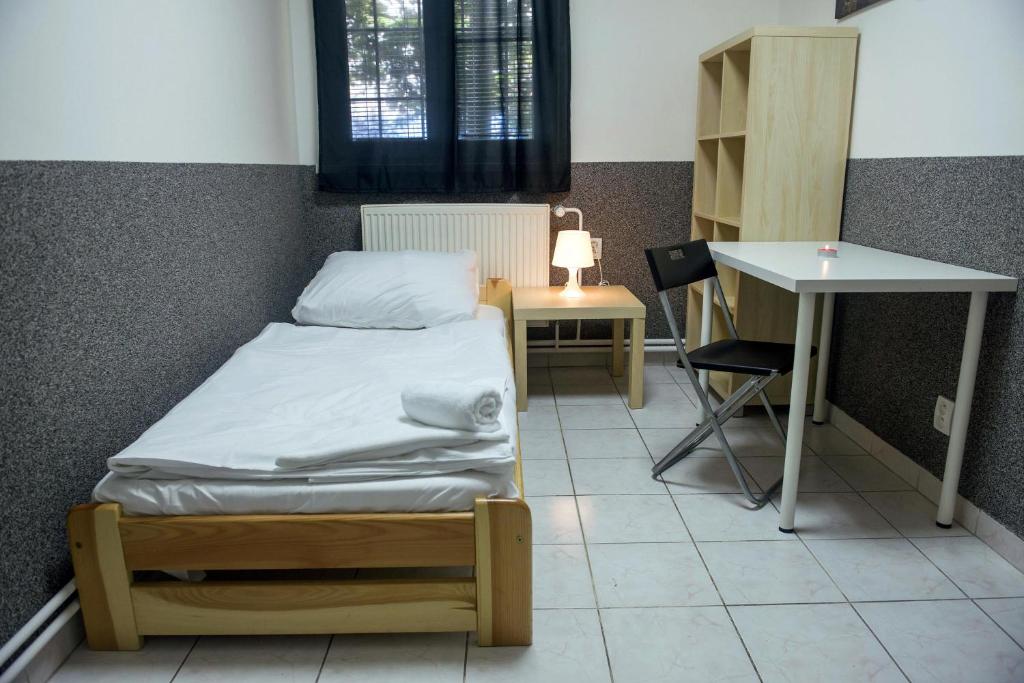 Voodi või voodid majutusasutuse Hostel Seven toas