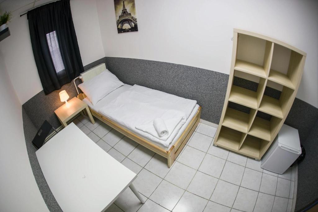 Voodi või voodid majutusasutuse Hostel Seven toas