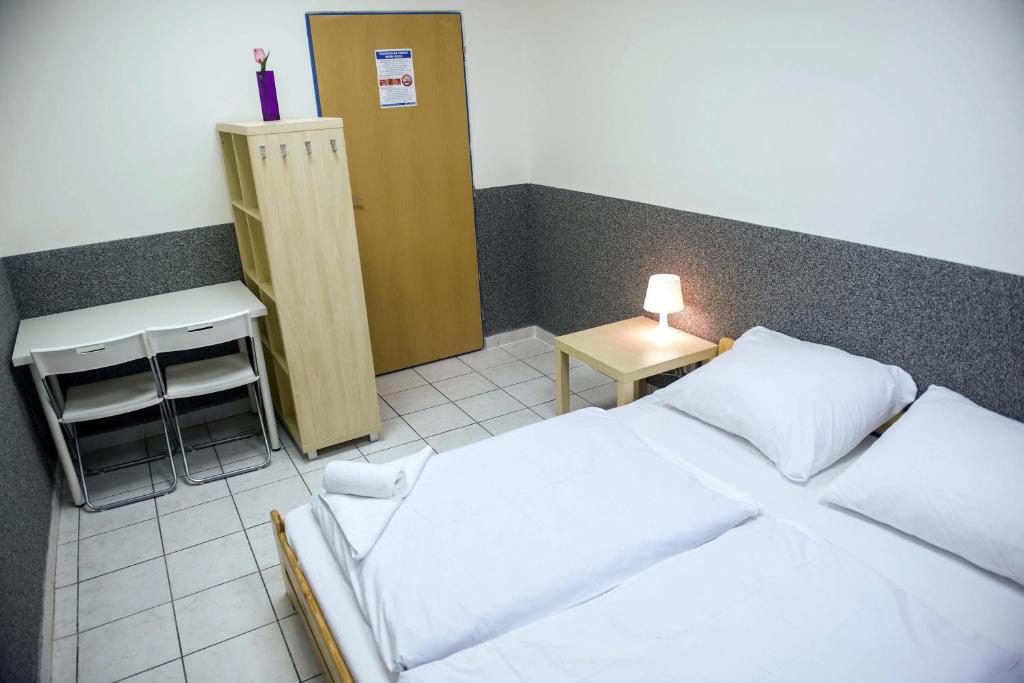Voodi või voodid majutusasutuse Hostel Seven toas