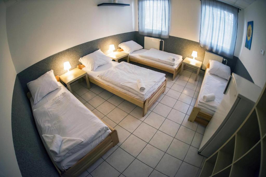 Voodi või voodid majutusasutuse Hostel Seven toas