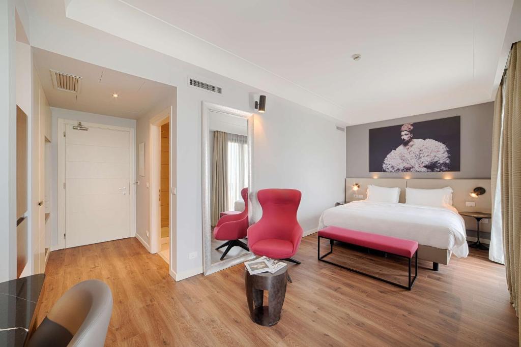 Postel nebo postele na pokoji v ubytování Radisson Blu Hotel Milan