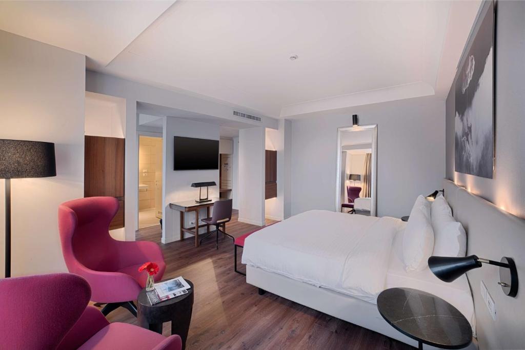 TV a/nebo společenská místnost v ubytování Radisson Blu Hotel Milan