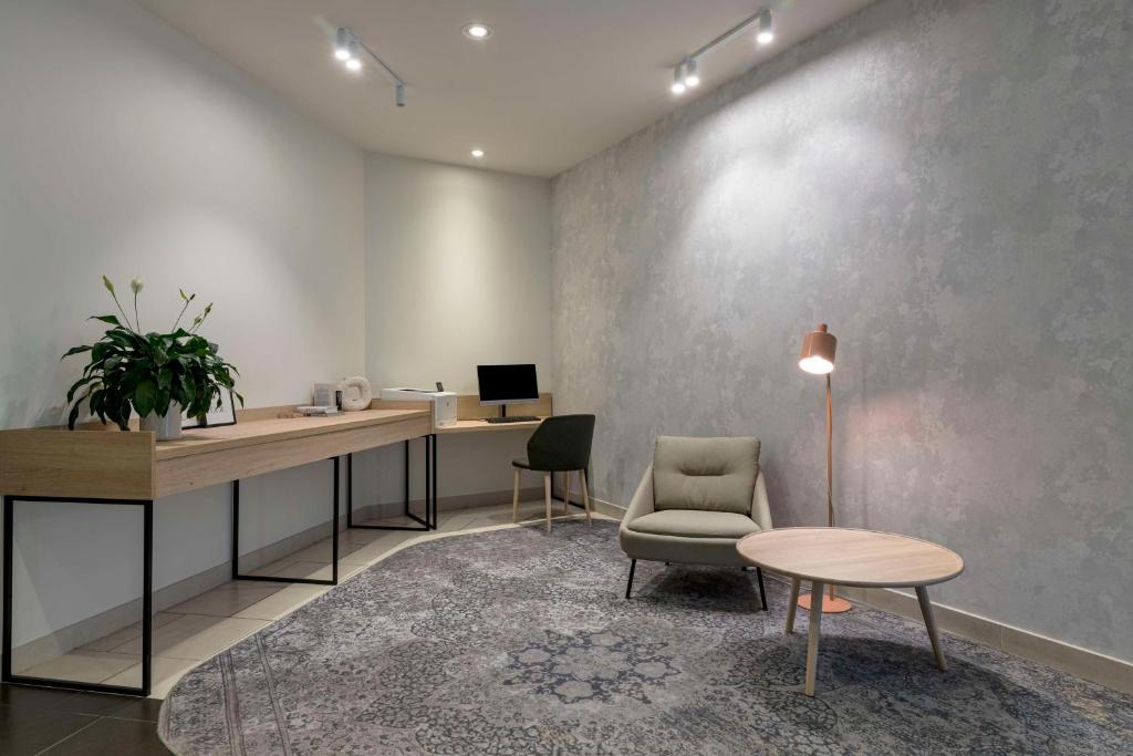 Televízia a/alebo spoločenská miestnosť v ubytovaní Park Inn by Radisson Krakow
