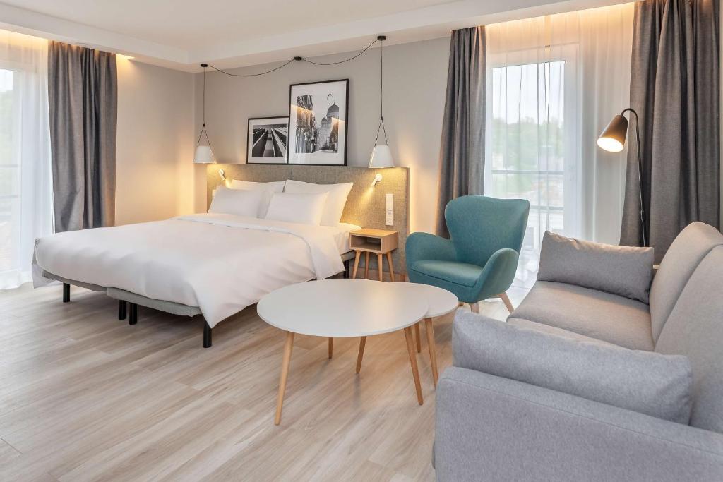 Postel nebo postele na pokoji v ubytování Radisson Hotel Kaunas