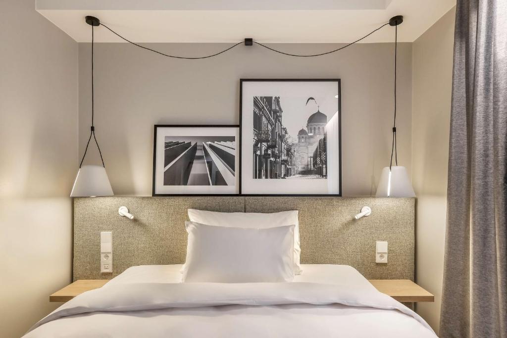Postel nebo postele na pokoji v ubytování Radisson Hotel Kaunas
