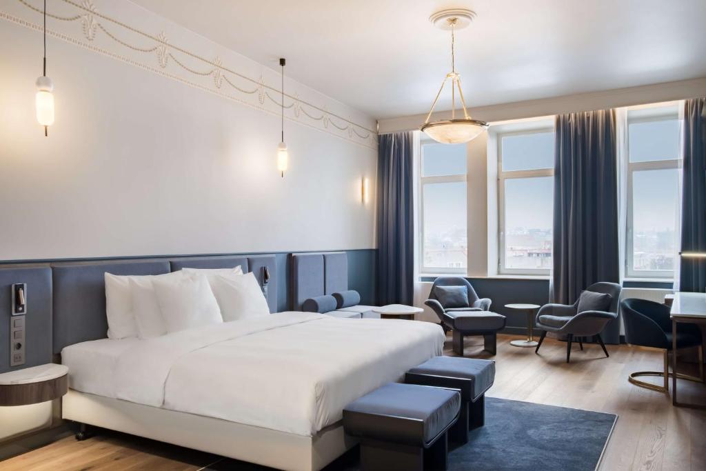 Postel nebo postele na pokoji v ubytování Radisson Collection Astorija Hotel, Vilnius
