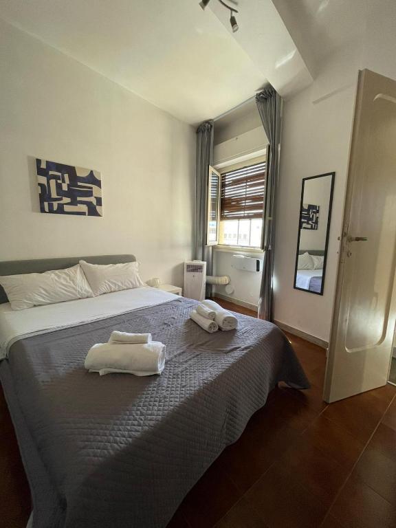 A bed or beds in a room at 100 PASSI Politeama