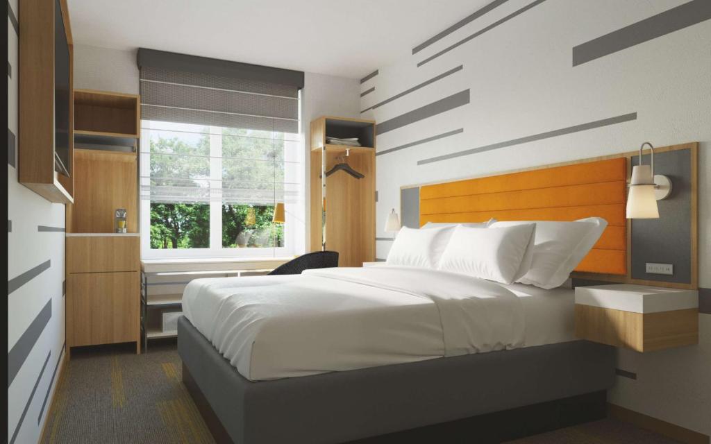 Postel nebo postele na pokoji v ubytování Hampton Inn by Hilton New York Times Square