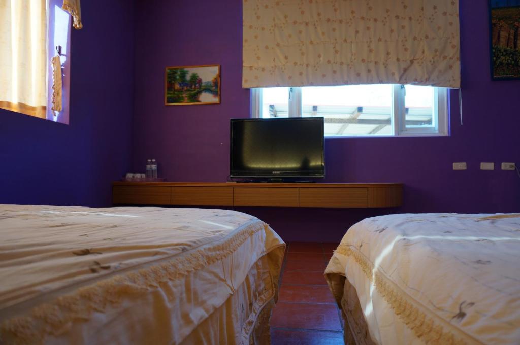 Postel nebo postele na pokoji v ubytování See Starsea Guest House