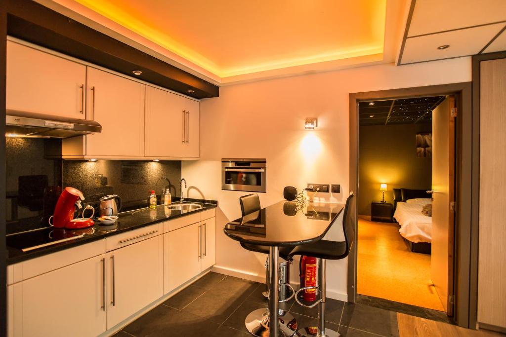 Kuchyň nebo kuchyňský kout v ubytování Wellness Hasselt B&B