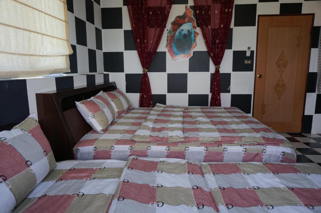 Postel nebo postele na pokoji v ubytování See Starsea Guest House