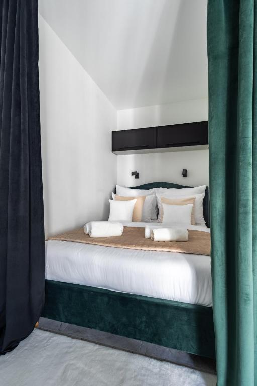 Postel nebo postele na pokoji v ubytování Apartamenty we Wrocławiu - Jaworska
