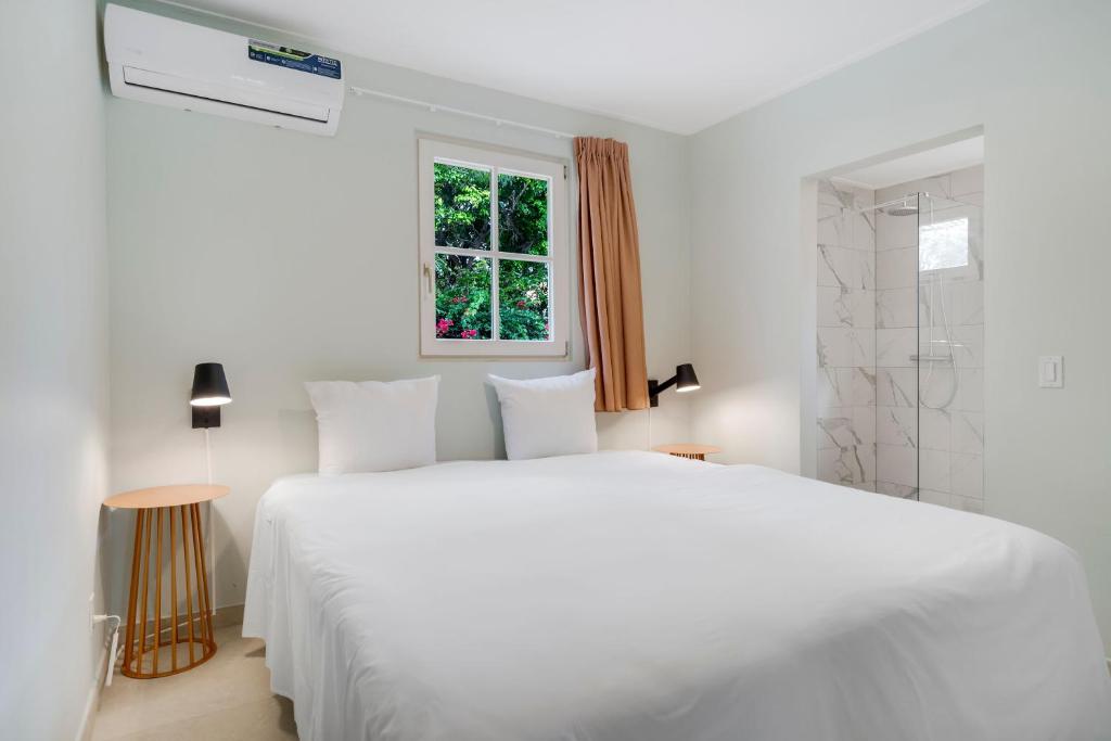 Voodi või voodid majutusasutuse Livingstone Jan Thiel Resort toas