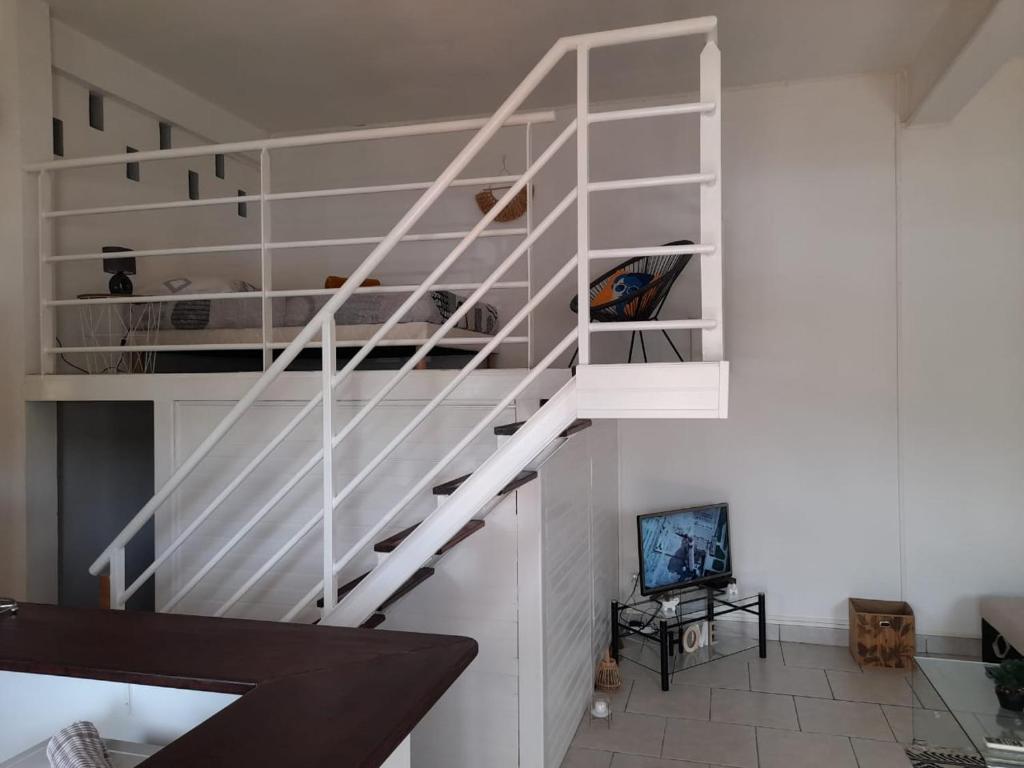 TV a/nebo společenská místnost v ubytování Appartement Mezzanine