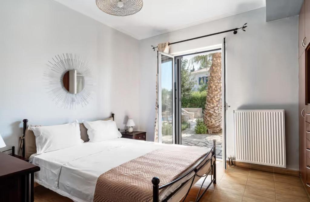 Postel nebo postele na pokoji v ubytování Key Villas